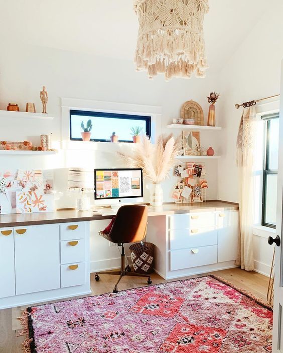 Pink Bohemian Rug in Boho Office Design with Macrame Ceiling Pendnat, Pampas grass decor and swivel office chair
